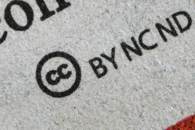 A close up of a license sign on a piece of paper photo – Free Grey Image on Unsplash